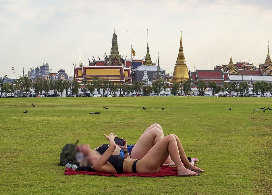 touristes bronzage