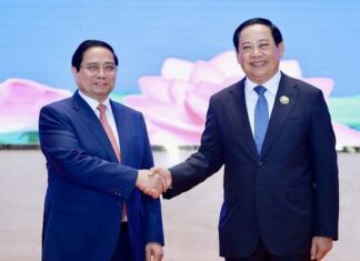 LAOS – VIETNAM : Objectif de 5 milliards de dollars américains pour les échanges entre les deux pays Sonexay Siphandone - Pham Minh Chinh
