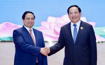 LAOS – VIETNAM : Objectif de 5 milliards de dollars américains pour les échanges entre les deux pays Sonexay Siphandone - Pham Minh Chinh
