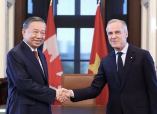 To Lam et Mark Carney